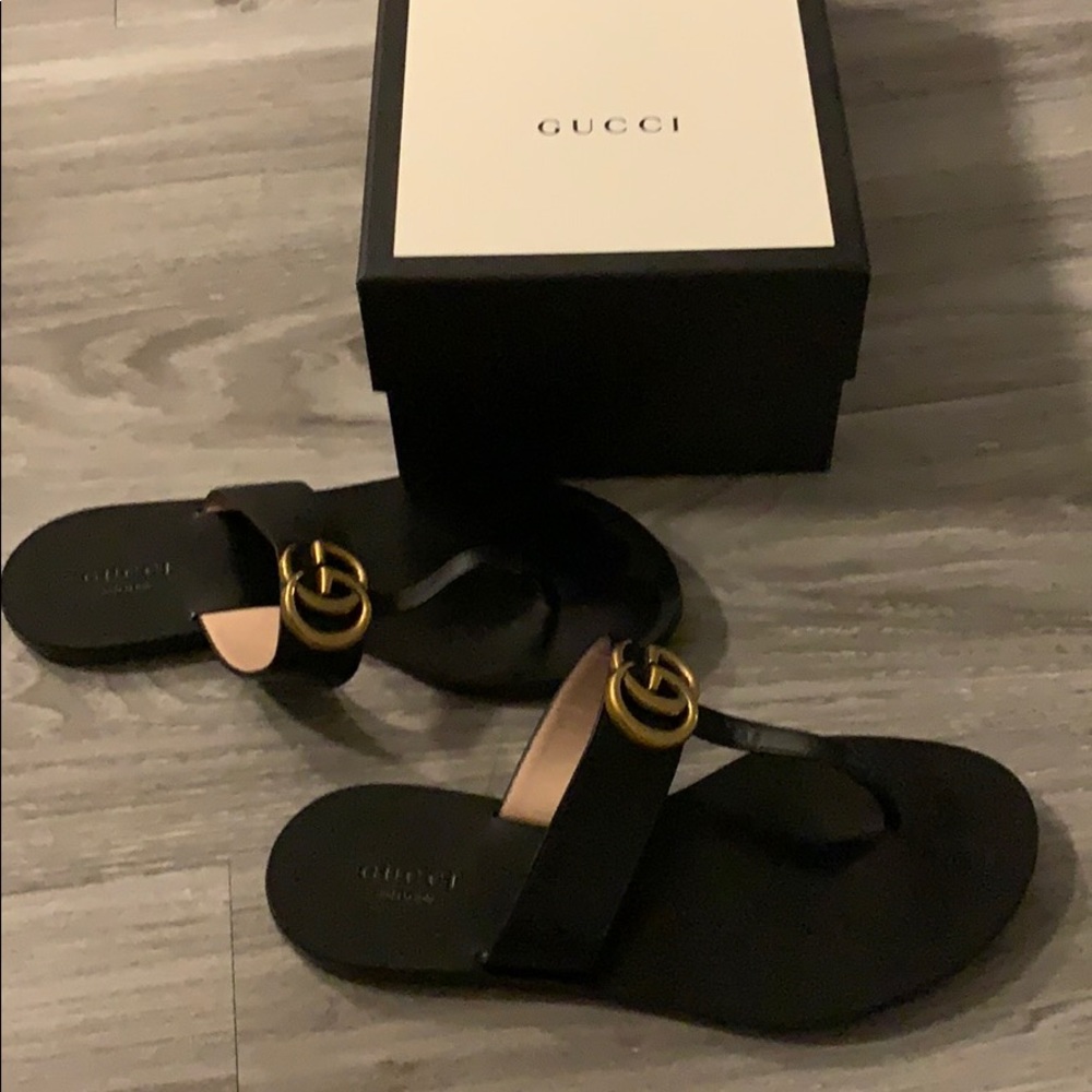Gucci Black Slippers with Gold Accents